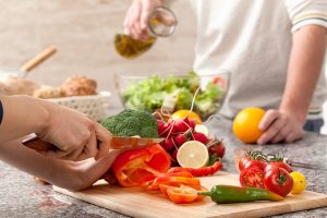 Cutting a vegetables for salad