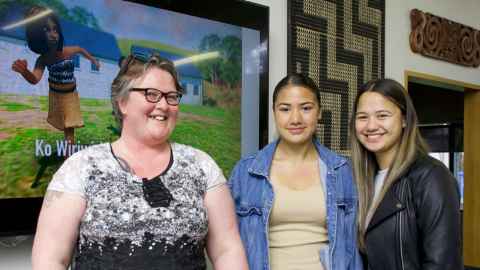 Ms Ruth Lemon with Tyme Harema-Watts and Breeze Harema-Watts, the voice talent of the two girls in the app, at the launch event last Tuesday. Image courtesy of University of Auckland.
