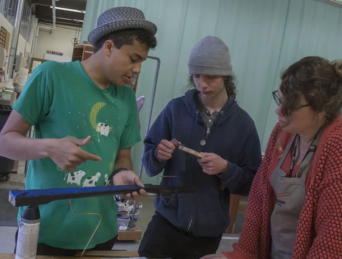Teaching kids how to make guitars can get them hooked on engineering