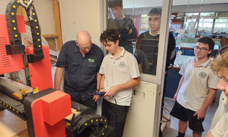 students using a cnc router